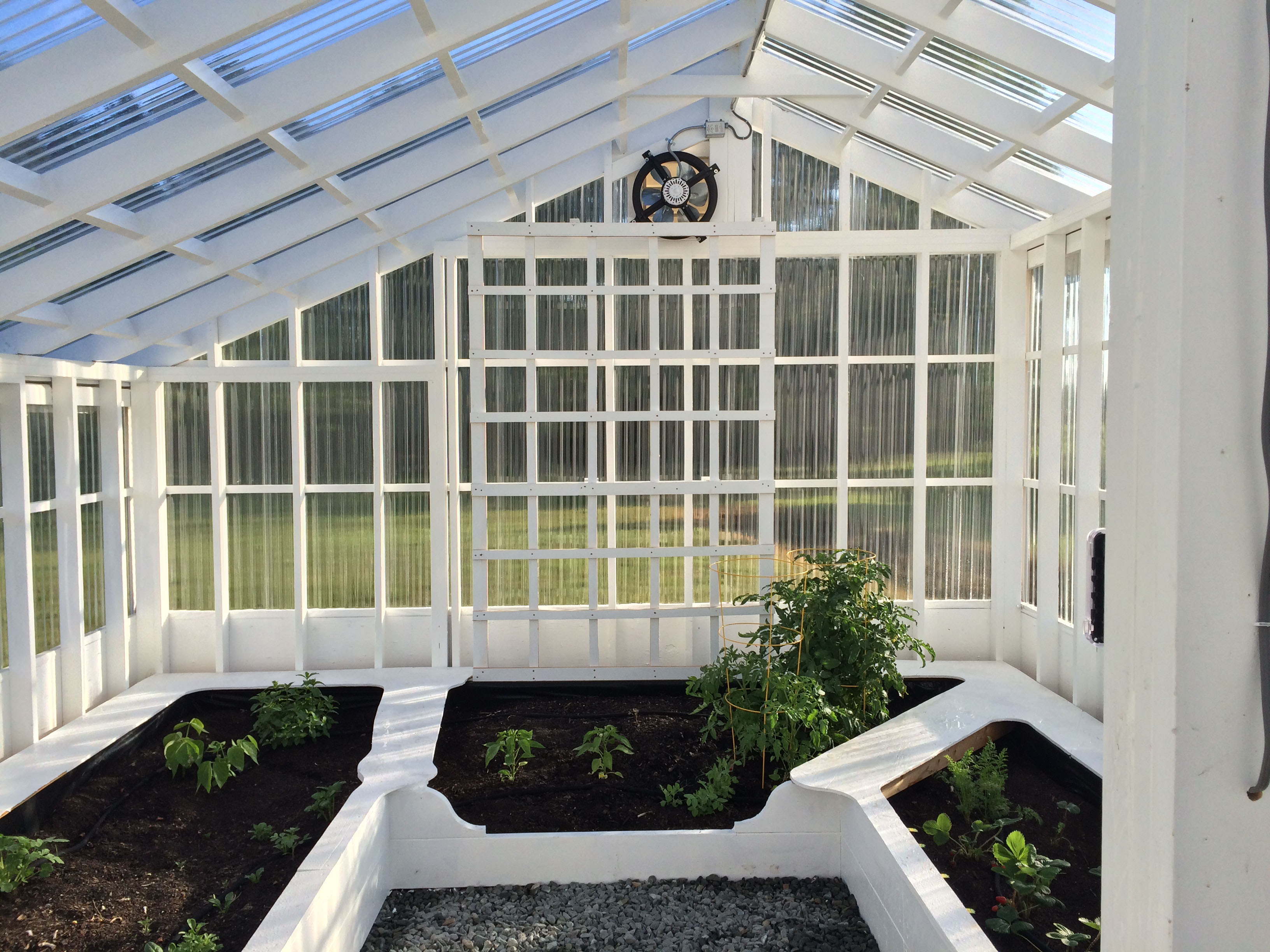 white greenhouse buiolt from Onduclair